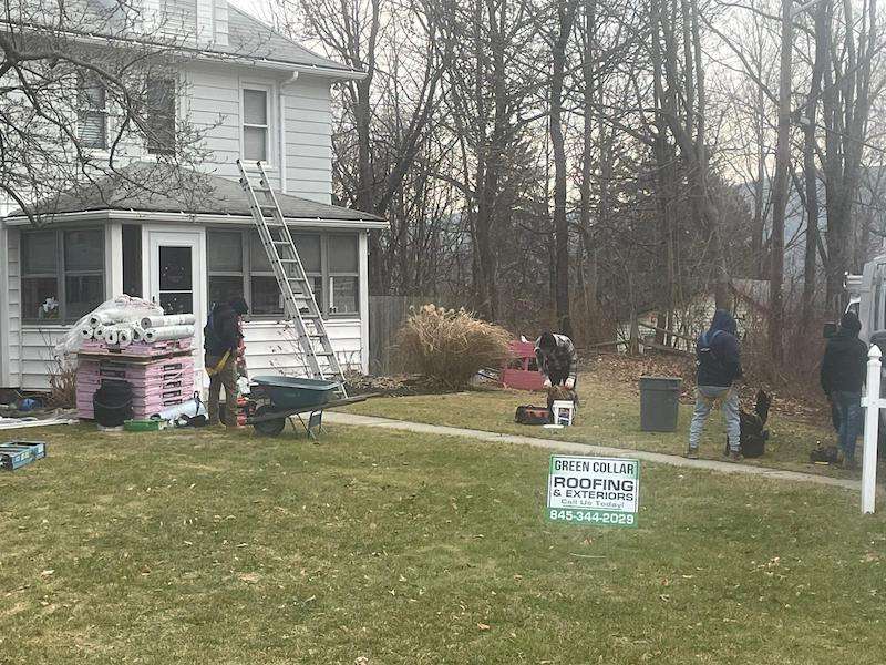 A Cleared Area Around a Home Ready For Roof Replacement